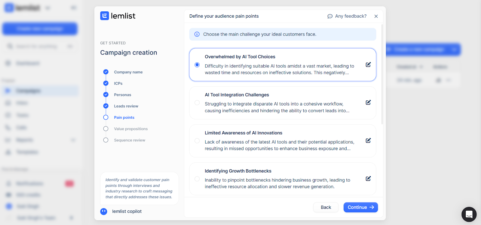 Lemlist pain points screen with AI-suggested challenges like tool overload, integration issues, and growth bottlenecks.