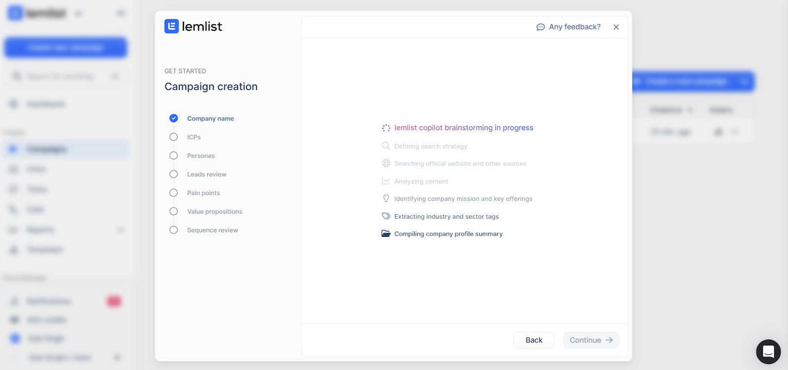 Lemlist Copilot progress screen showing website crawling and company profile analysis.